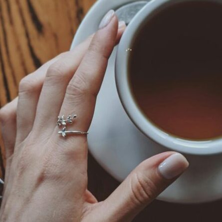minimal leaf design ring on hand
