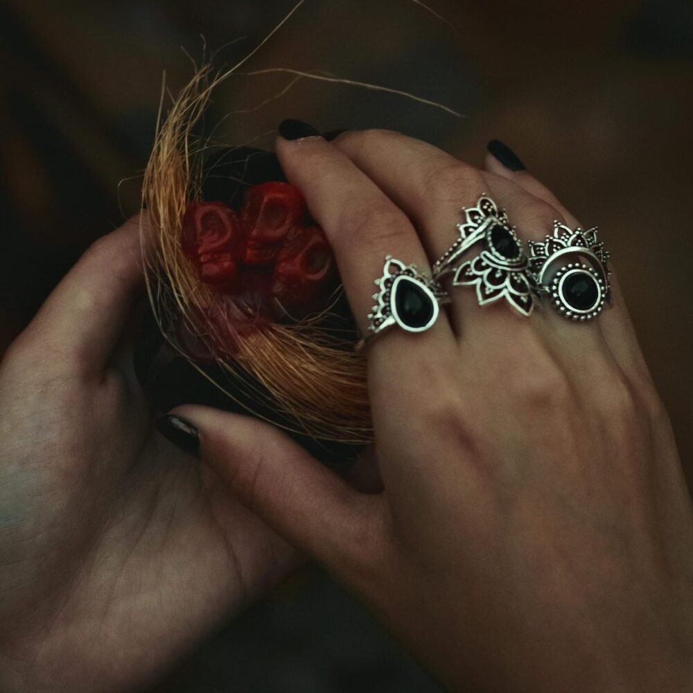 artistic silver rings with black accents